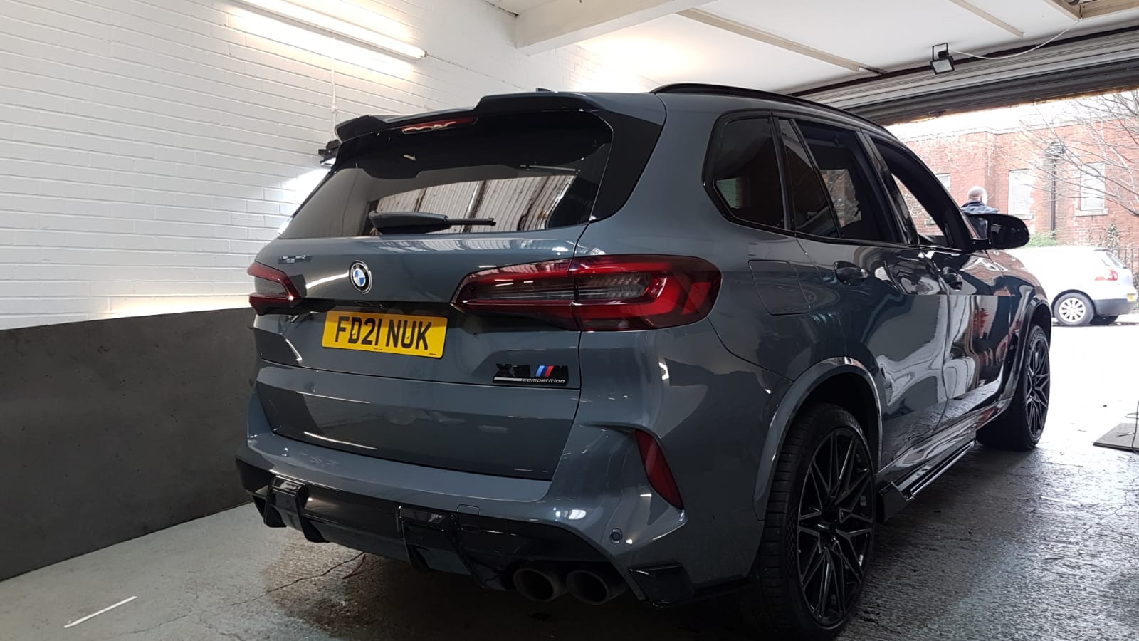 BMW X5M F95 2019-2022 pre-LCI gloss black kit by CT Carbon, featuring sleek exterior enhancements on the vehicle.