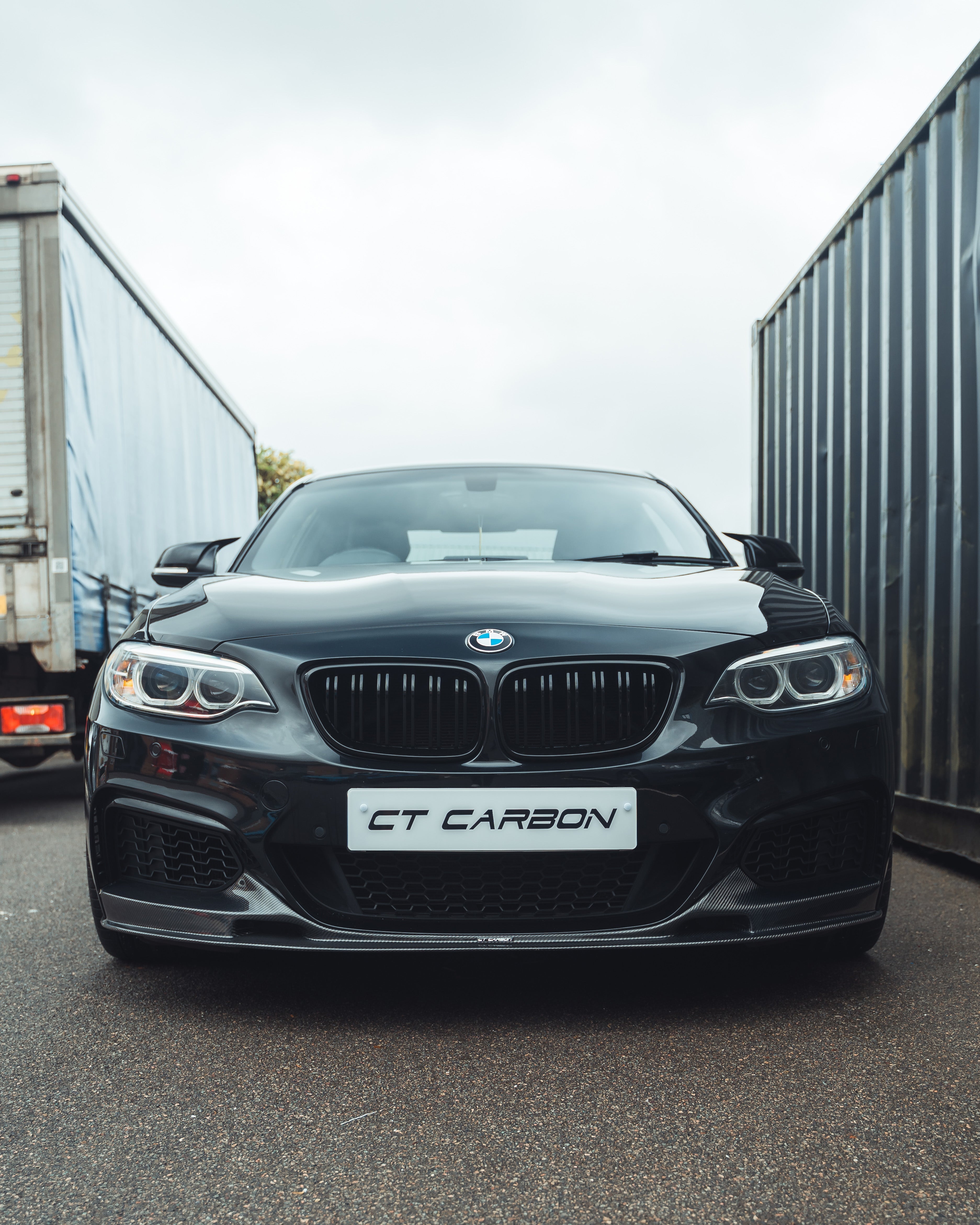 BMW M2 F87 and F22 2 Series double slat black grille by CT Carbon, showcasing sleek, high-quality automotive grille design.
