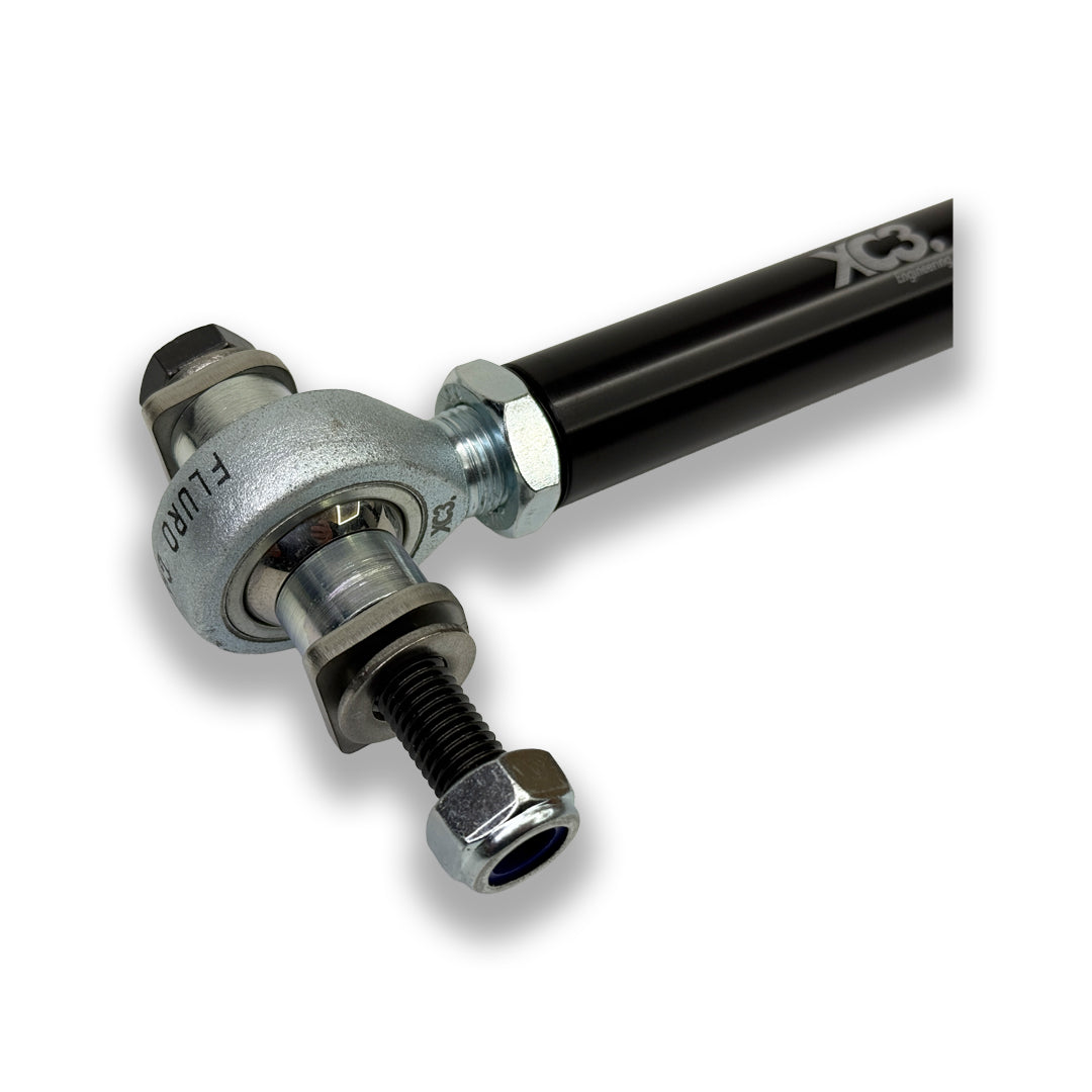 BMW M2 G87, M3 G80 G81, M4 G82 G83 adjustable rear toe arms for G8X platform by XC3 Engineering, showing close-up of suspension components.