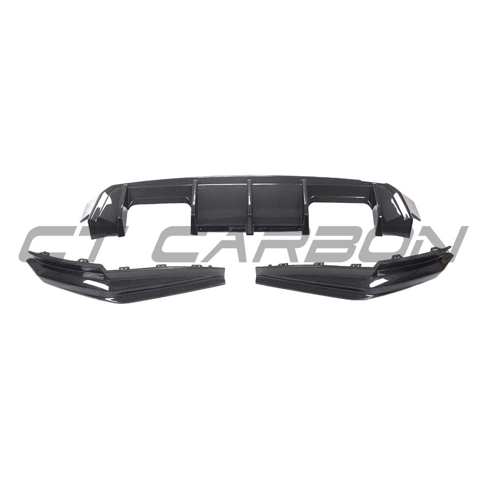 BMW G80 M3 full carbon fibre kit by CT Carbon, featuring a diffuser with a sleek carbon finish and detailed design elements.