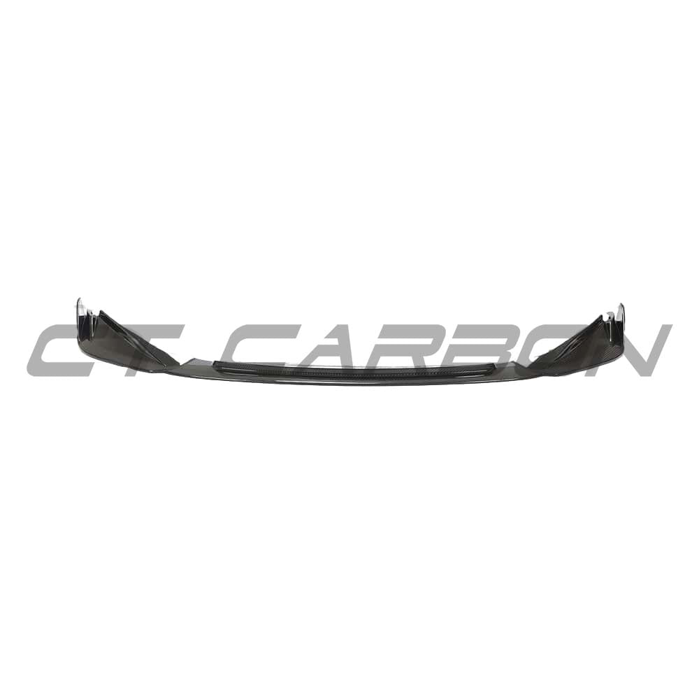 BMW G82 M4 full carbon fibre kit by CT Carbon, including front splitter and aerodynamic components, in a sleek carbon fibre finish.