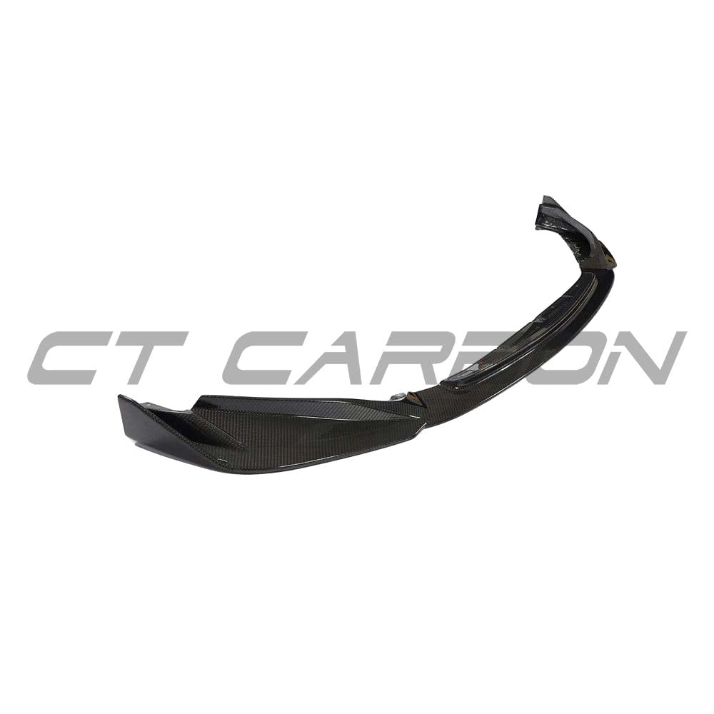 BMW G80 M3 full carbon fibre kit by CT Carbon, showing sleek carbon fibre parts on the car's exterior, including hood and side panels.