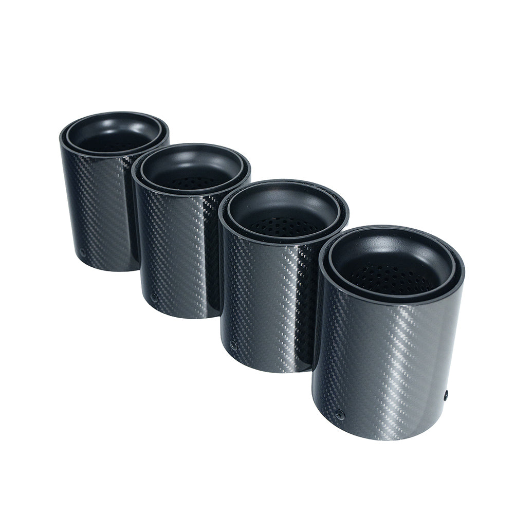 Set of four BMW F90/F92 M5 carbon fiber exhaust tips by CT Carbon in matte black, showcasing sleek, durable exhaust upgrade.