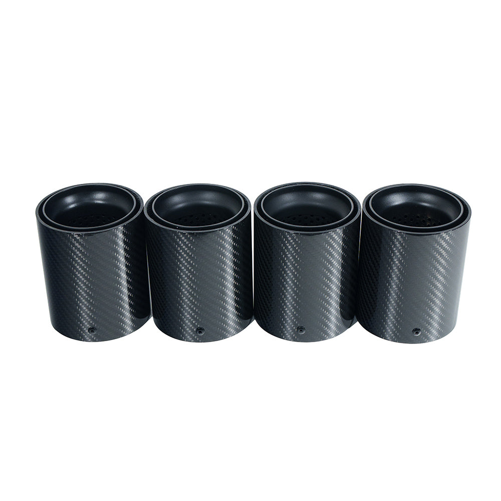 Set of four BMW F90/F92 M5 carbon fiber exhaust tips by CT Carbon in matte black, showcasing sleek, durable vehicle exhaust accessories.