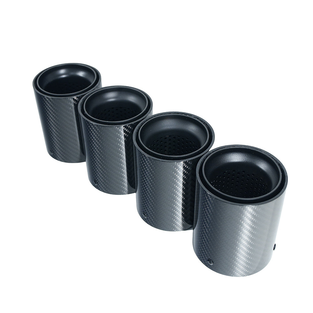 Set of four matte black carbon fiber BMW F90/F92 M5 exhaust tips by CT Carbon, showcasing sleek, high-performance car accessories.