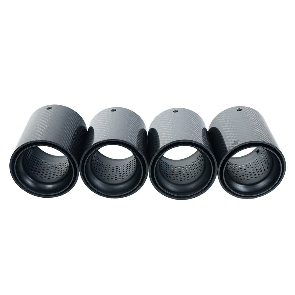 Set of four BMW F90/F92 M5 carbon fiber exhaust tips in matte black by CT Carbon, showcasing sleek, aerodynamic design.