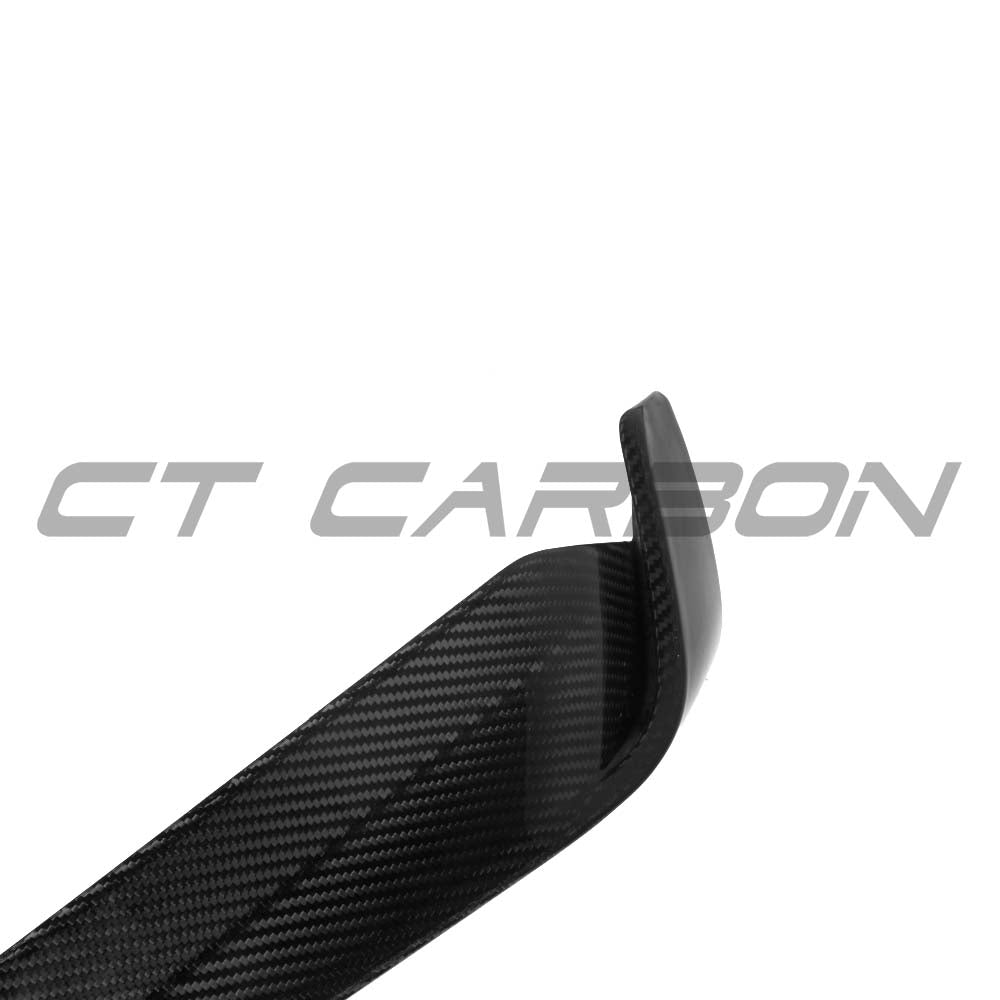 BMW G05 X5 LCI 2023+ CT Carbon V1 carbon fibre splitter installed on front bumper, showcasing sleek, aerodynamic design.