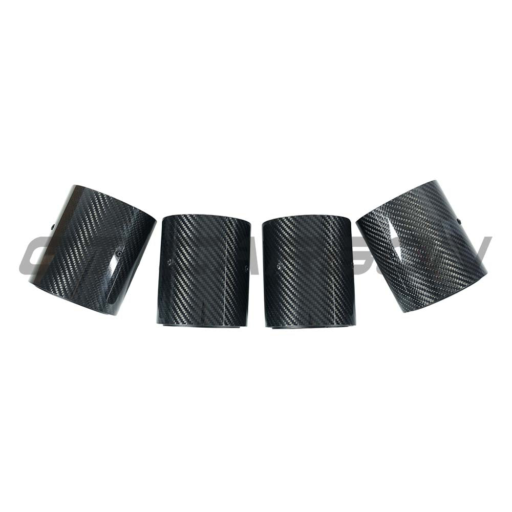 Set of four black carbon exhaust tips for BMW M2, M3, M4 G87/G80/G81/G82/G83 by CT Carbon, straight cut design.
