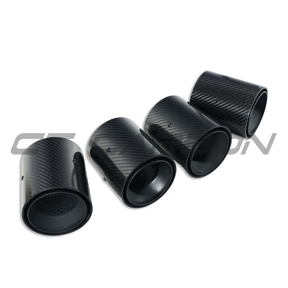 Set of four black carbon exhaust tips for BMW M2, M3, M4 G87/G80/G81/G82/G83 from CT Carbon, straight cut design.