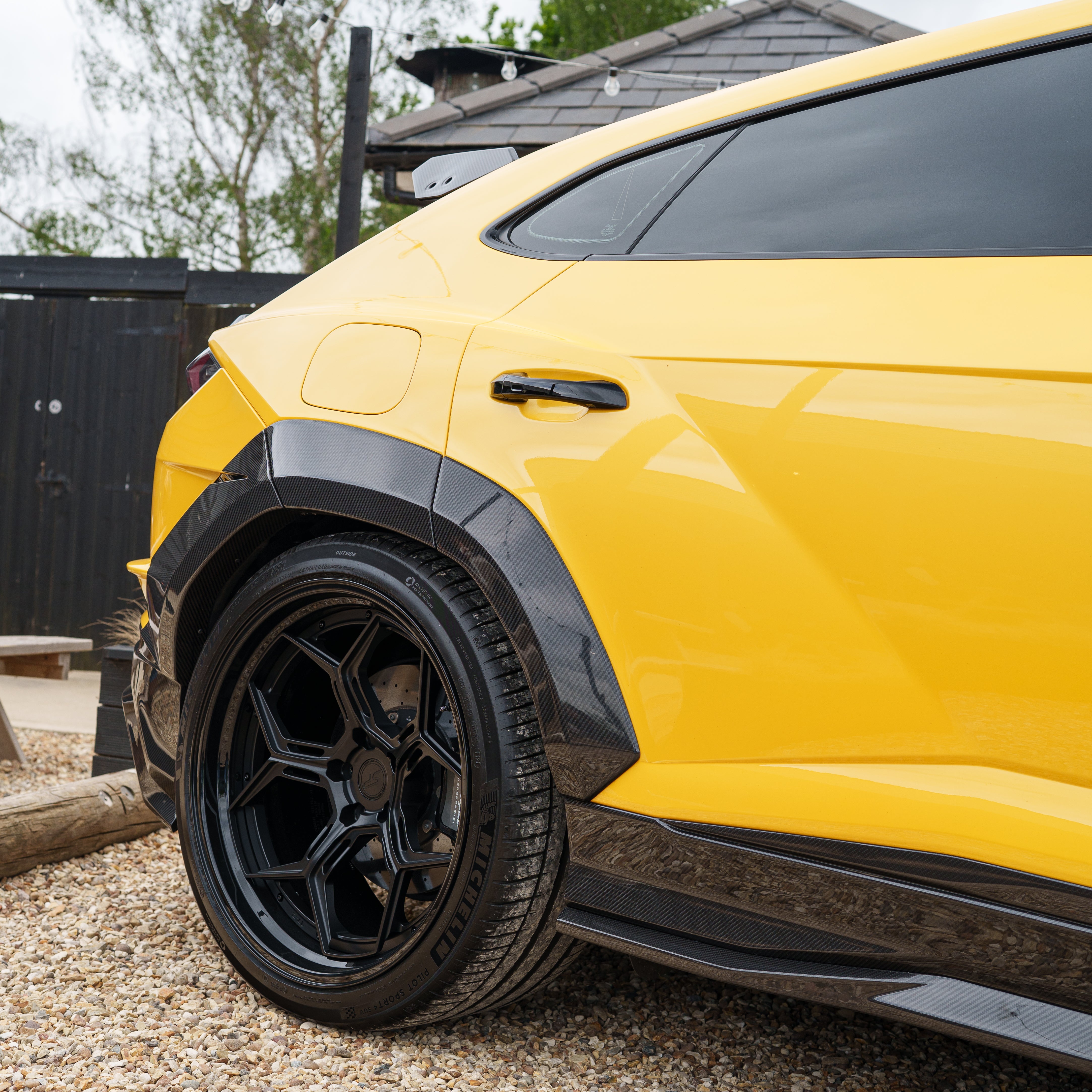 CT Carbon Lamborghini Urus Performante carbon fibre arches, showcasing sleek, lightweight automotive enhancements.