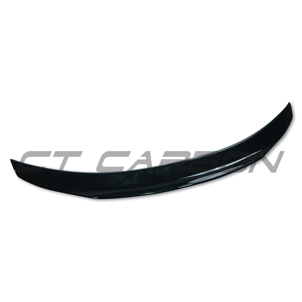 Gloss black carbon fiber spoiler for Mercedes C-Class W205 coupe, 2015-2021, by CT Carbon, shown on a sleek vehicle.