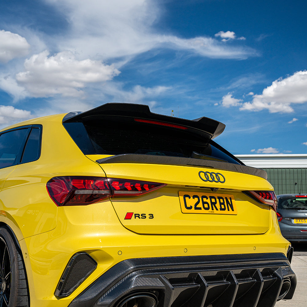 Carbon fiber spoiler for Audi A3/S3/RS3 8Y Sportback, model 2022+ by CT Carbon, shown on a sleek vehicle.