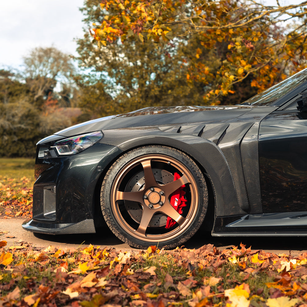 BMW G87 M2 CT Carbon full car conversion kit made of lightweight carbon fibre, shown on a sleek, high-performance vehicle.