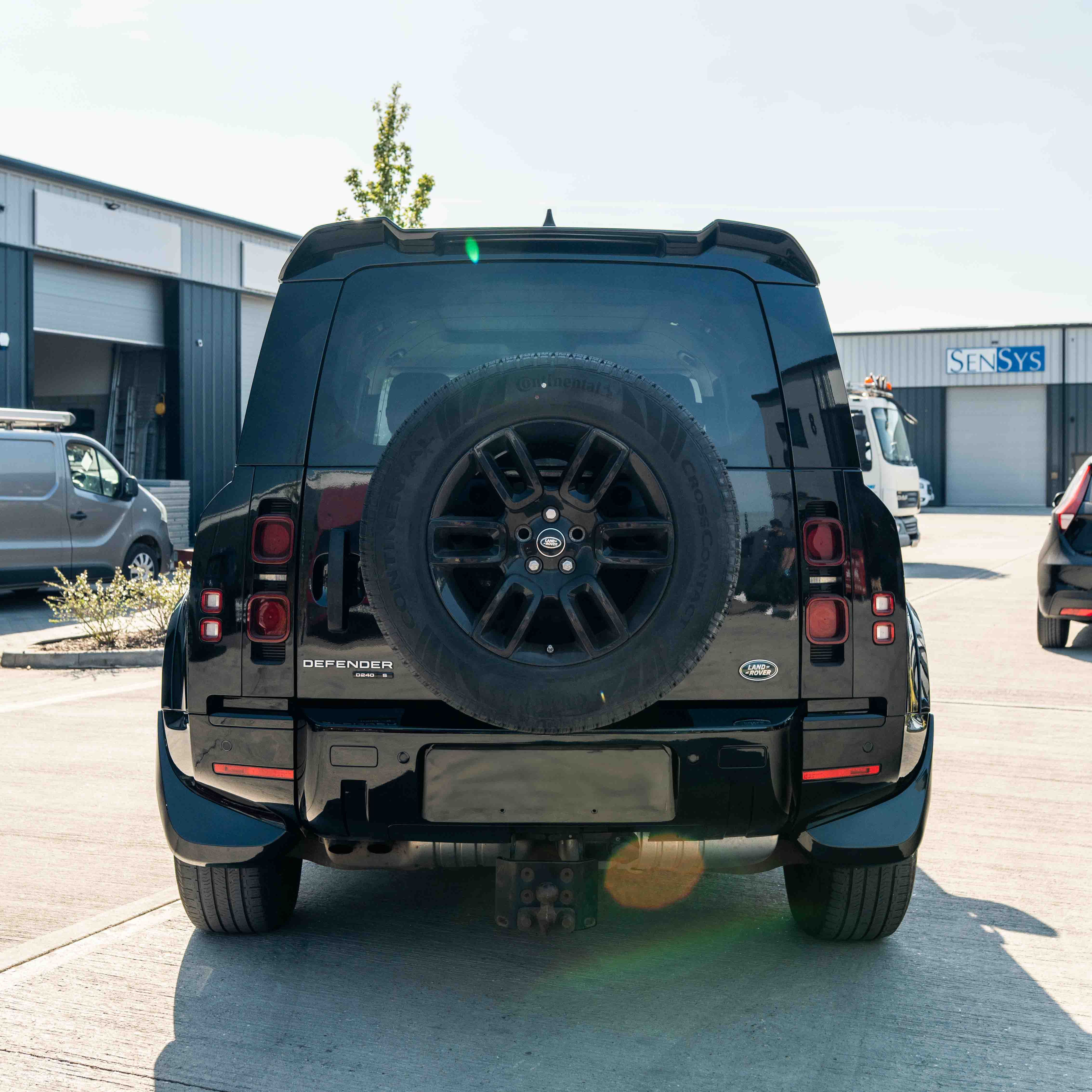 CT Carbon Land Rover Defender L663 110/90 front and rear gloss black middle trim kit, for stylish interior upgrade.
