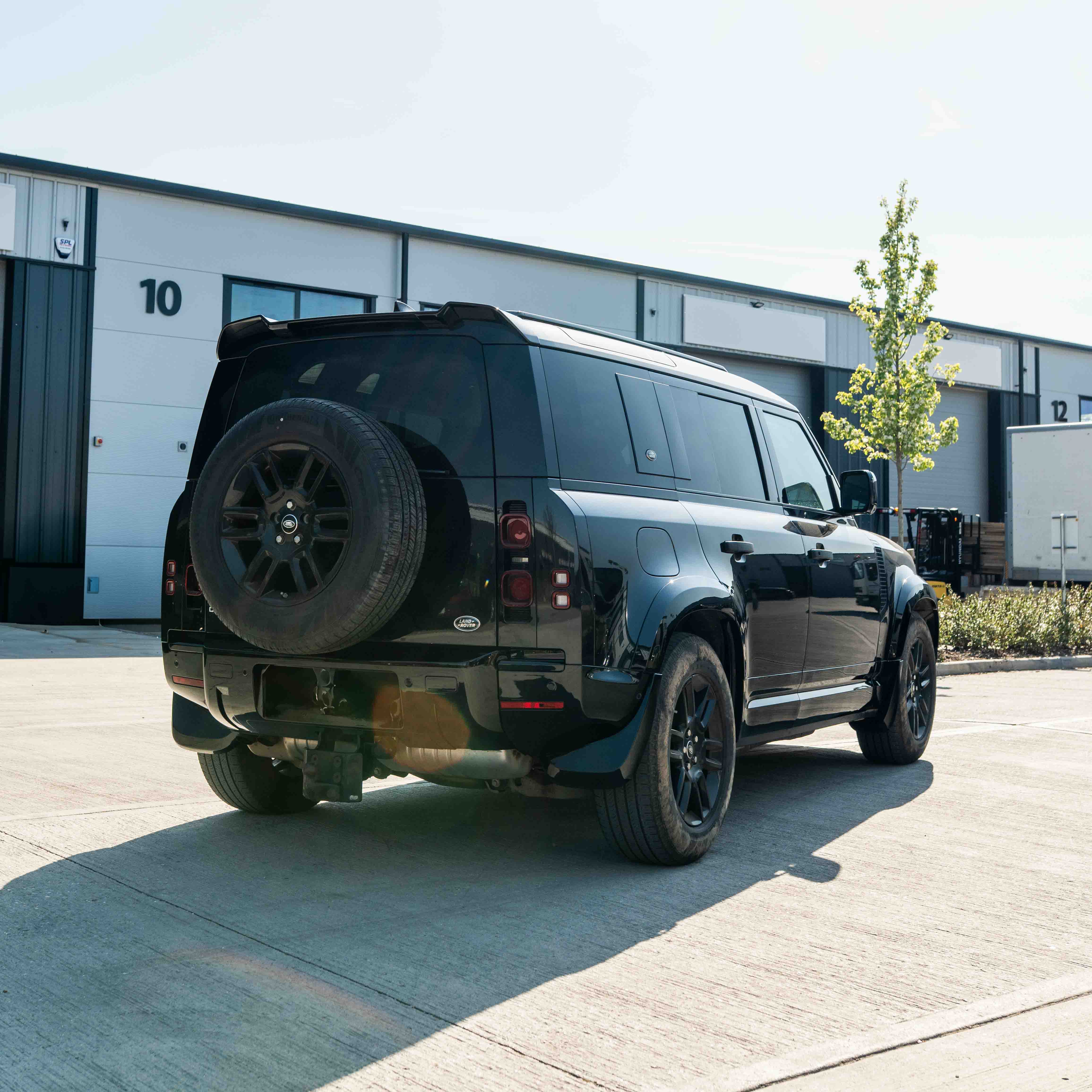 CT Carbon gloss black middle trim kit for Land Rover Defender L663 110 & 90 front and rear interior accents.