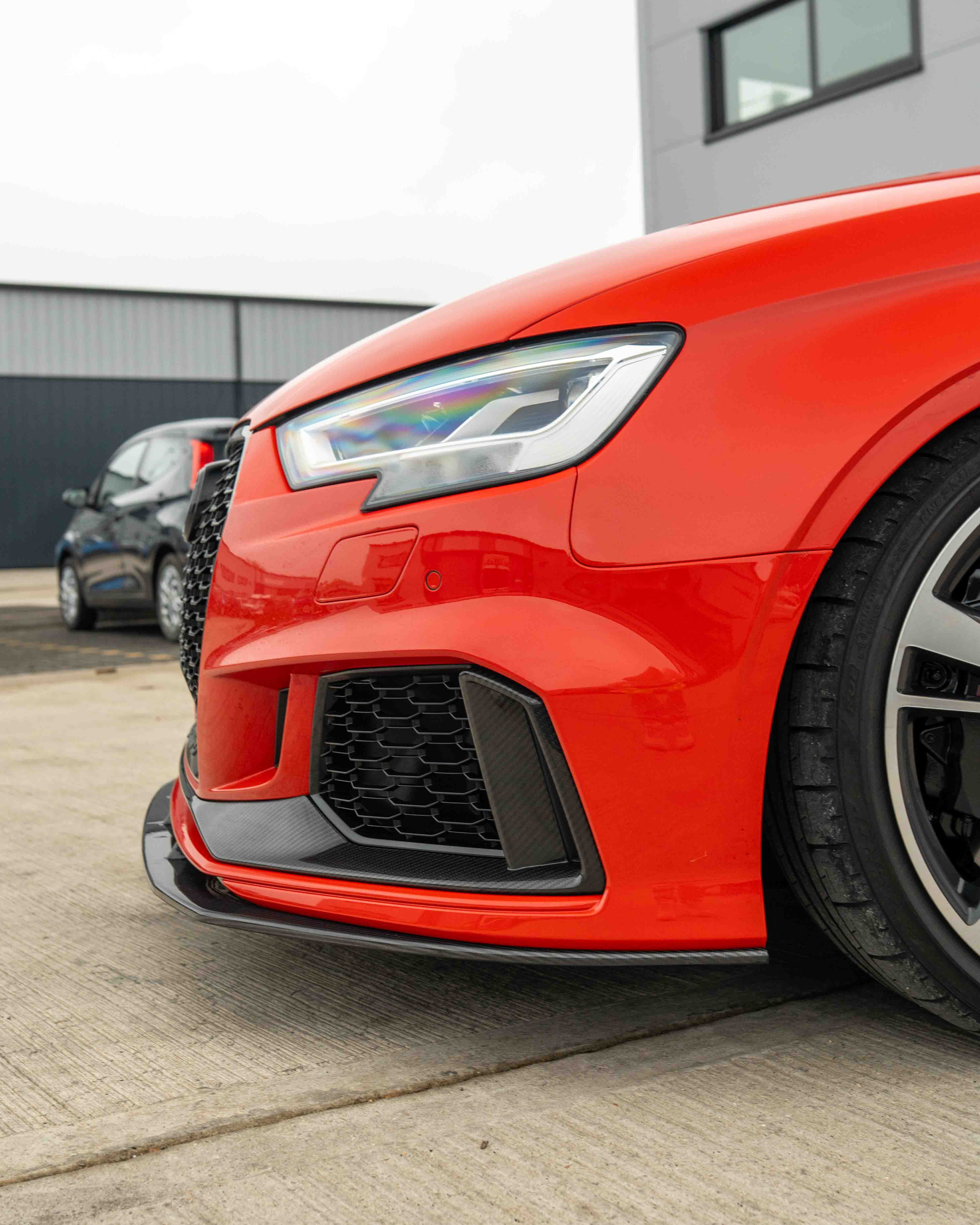 Audi RS3 8V facelift carbon fiber bumper trim accessory by CT Carbon, shown installed on the vehicle.