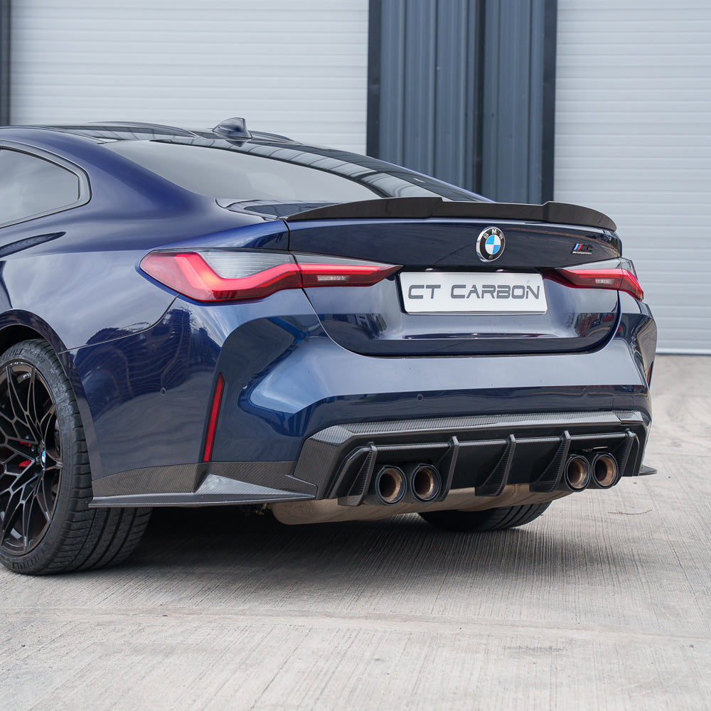 BMW M4 G82/G83 carbon fiber rear bumper corners by CT Carbon, V2, showcasing sleek, lightweight car accessory details.