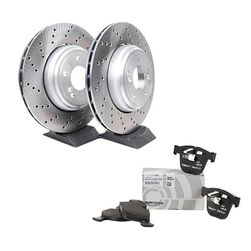 Genuine BMW E82 E90 E92 E93 M3 rear brake discs and pads set, showing metallic rotors and brake pad components.