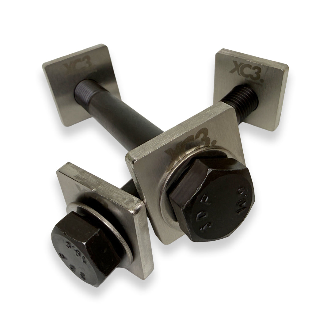 BMW M3 E9X E92 camber lockout shims from XC3 Engineering for suspension and alignment adjustment, shown in the image.