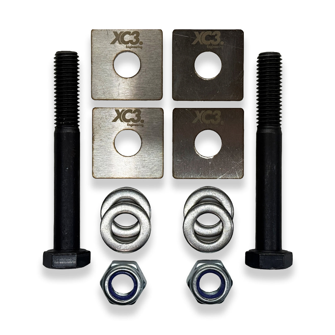 BMW M340i M440i F3X rear toe lockout shims by XC3 Engineering for suspension and alignment adjustment, shown in the image.