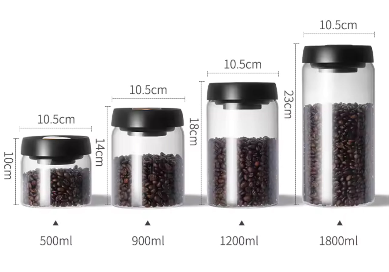 Set of four clear containers with black lids, filled with coffee beans, showing measurements on a white background.