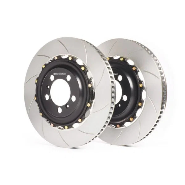 Two brake rotors on a white background
