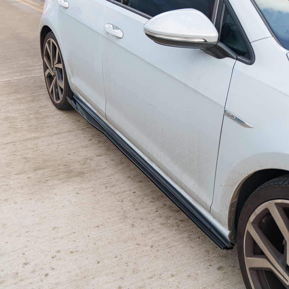 Gloss black side skirts for Volkswagen Golf MK7/7.5 GTR, GTD, GTI by CT Carbon, shown on a 2014-2020 model with a glossy finish.