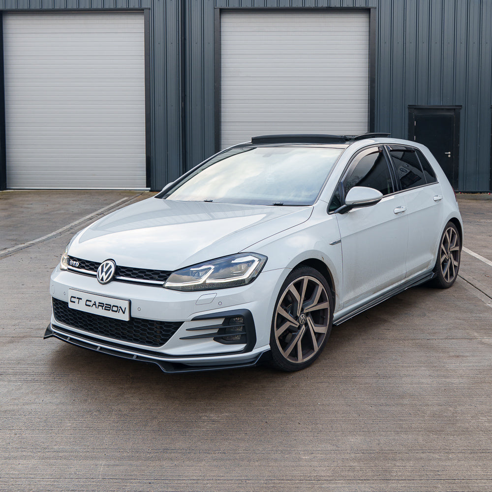 Gloss black side skirts for Volkswagen Golf MK7/7.5 GTI, R, GTD by CT Carbon, showing sleek exterior styling details.