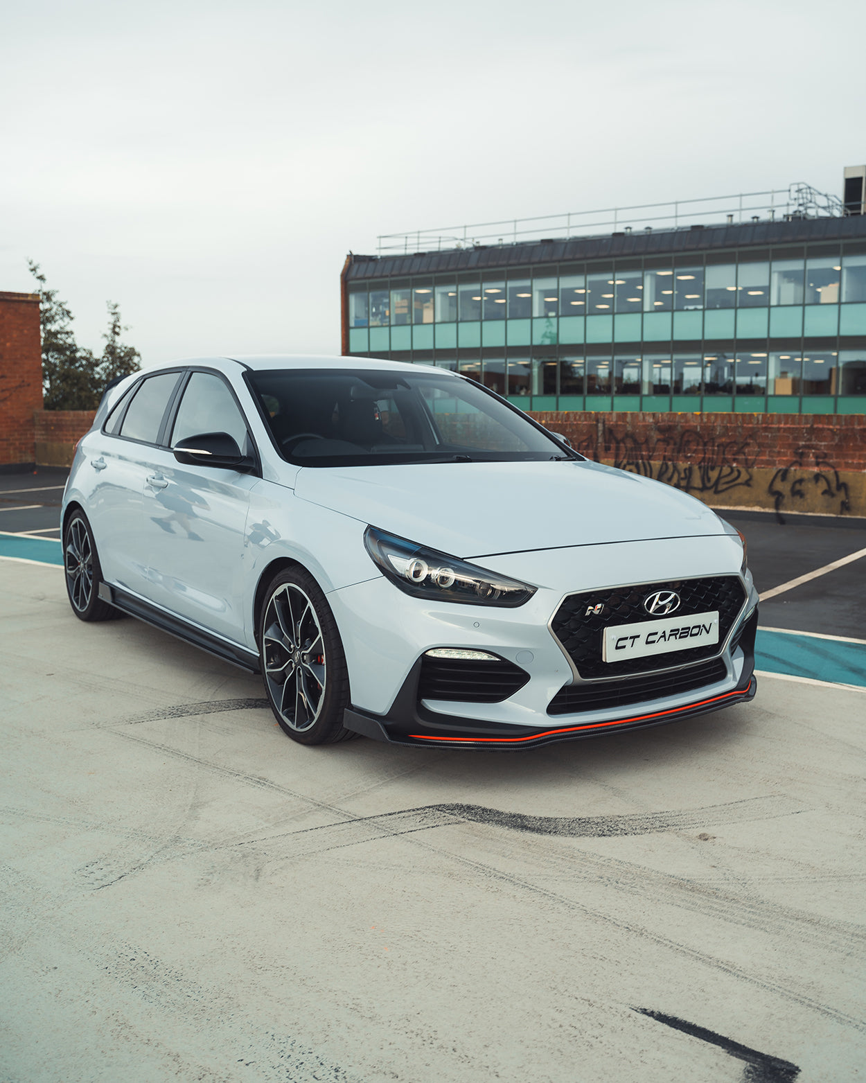 Hyundai i30N carbon fibre kit by CT Design, pre-facelift version, featuring lightweight, high-gloss carbon fiber components.