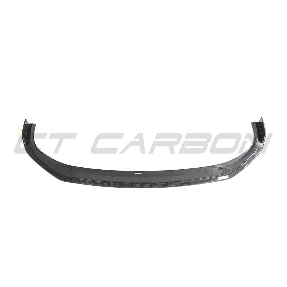 Hyundai i30N carbon fibre kit by CT Design, pre-facelift model, featuring sleek carbon fibre components on a white background.