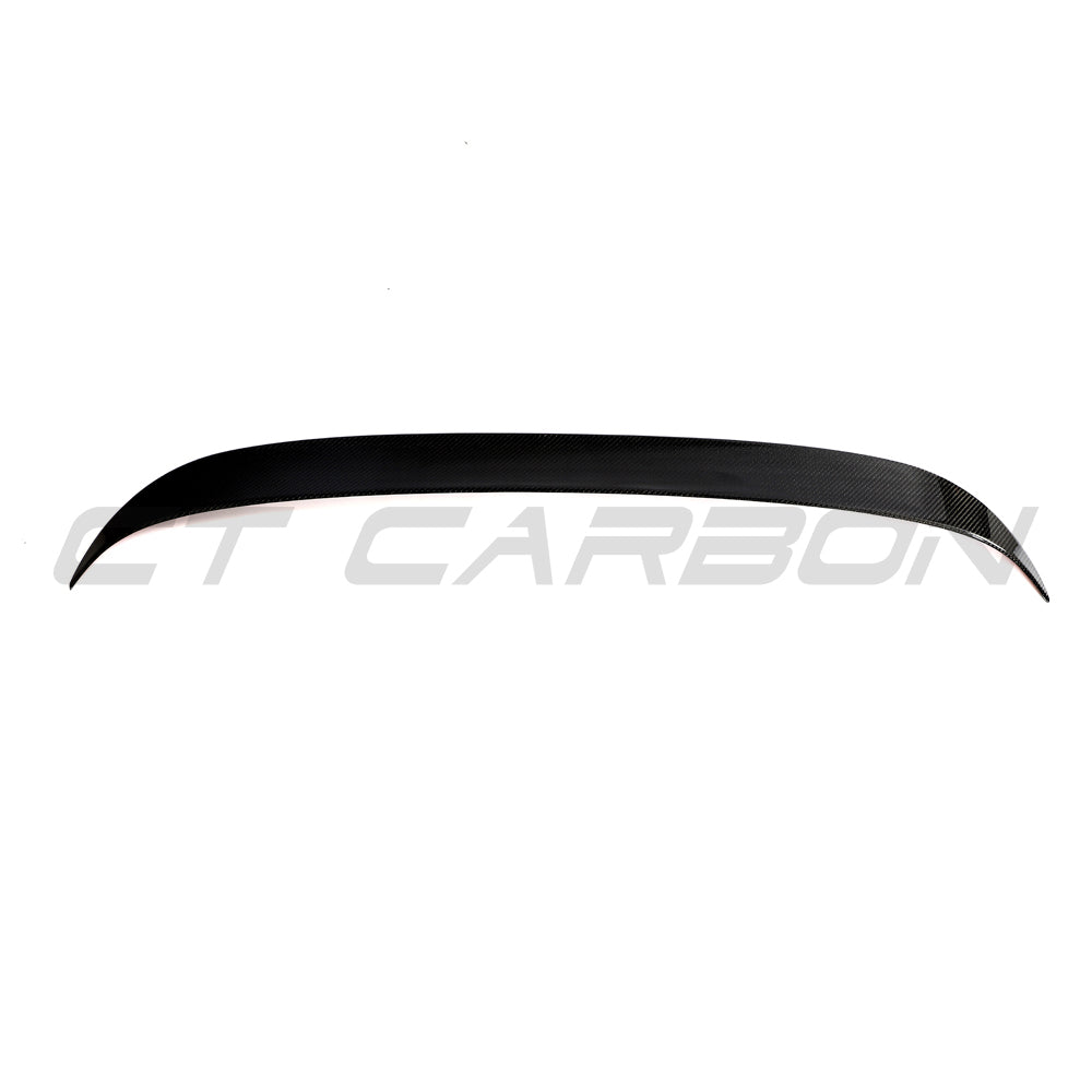 Hyundai i30N carbon fibre spoiler designed by CT Design, showcasing sleek, aerodynamic styling on the car.