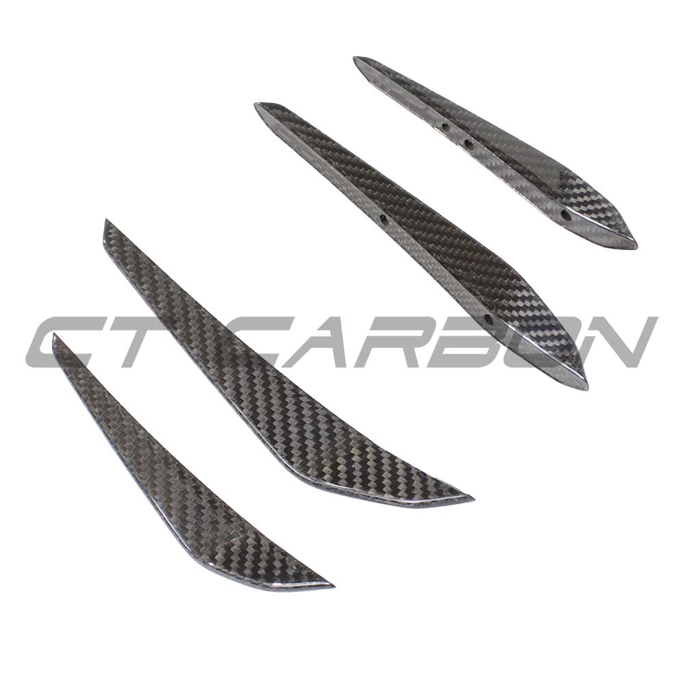 BMW M3 M4 G80 G82 carbon fibre front bumper canards by CT Carbon, showcasing lightweight aerodynamic accessories for 2021+ models.