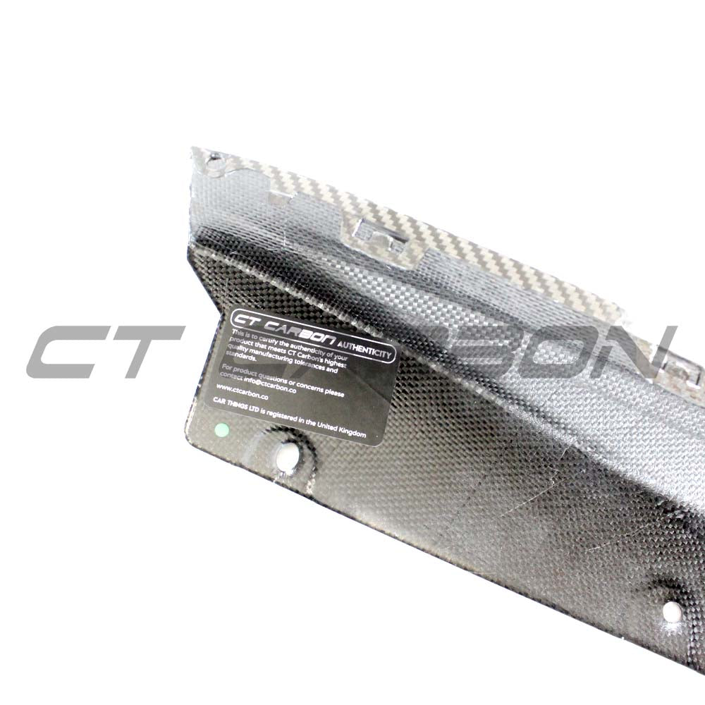 BMW M3 G80/G81 carbon fibre rear bumper corners by CT Carbon, showcasing sleek, lightweight accessory design for enhanced vehicle style.
