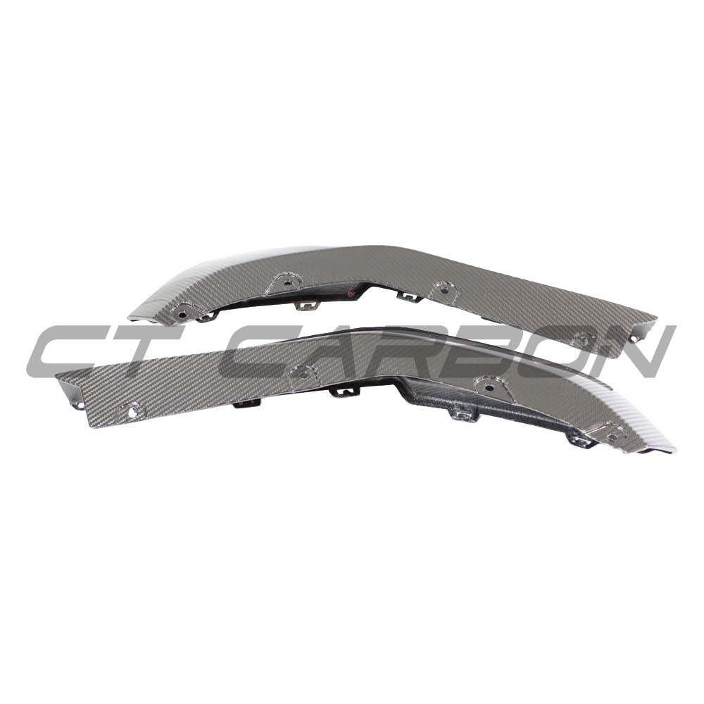 BMW M3 G80/G81 carbon fibre rear bumper corners by CT Carbon, V2 accessory, showcasing sleek, lightweight design.