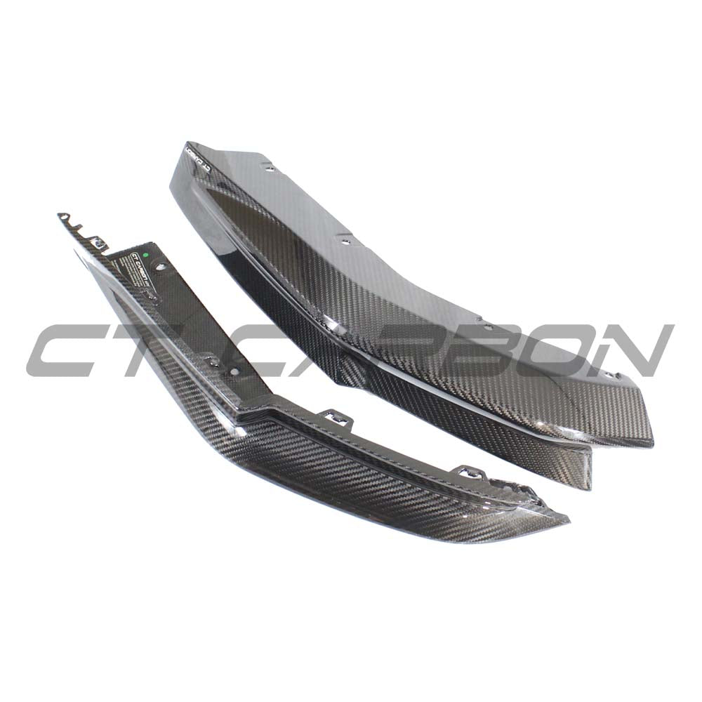 BMW M3 G80/G81 carbon fiber rear bumper corners accessory by CT Carbon, showing sleek black carbon fiber finish and precise fit.