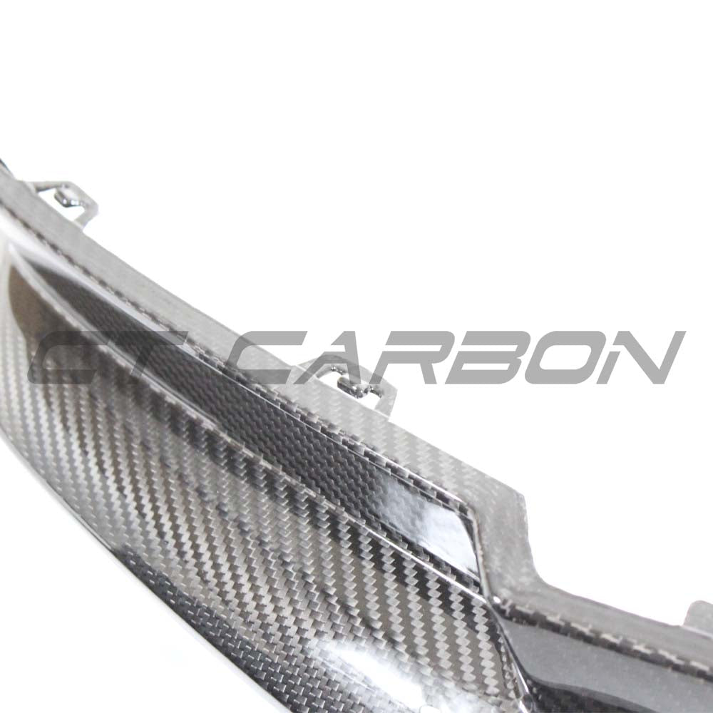 BMW M3 G80 G81 carbon fiber rear bumper corners by CT Carbon, showing sleek, lightweight accessory with detailed carbon fiber finish.