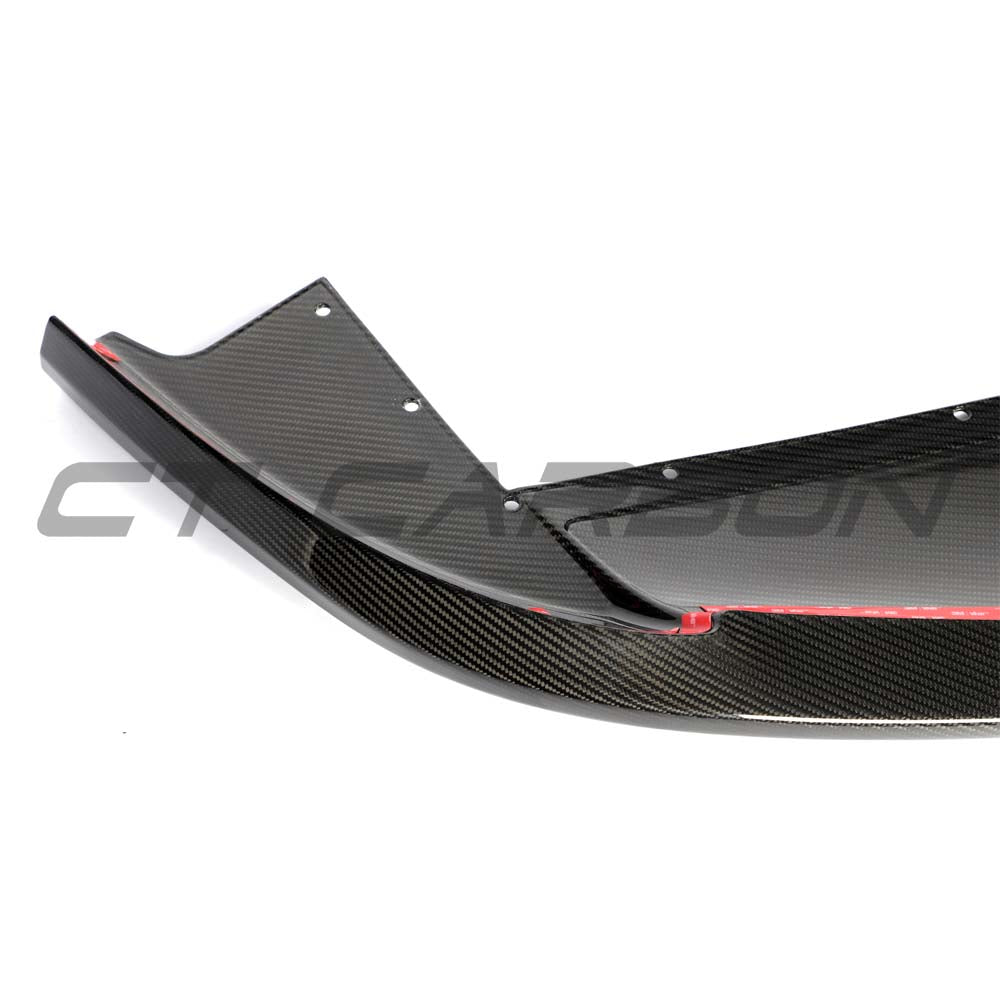 CT Carbon McLaren Artura 2023 carbon fiber splitter mounted on the front of the sports car with detailed close-up view.