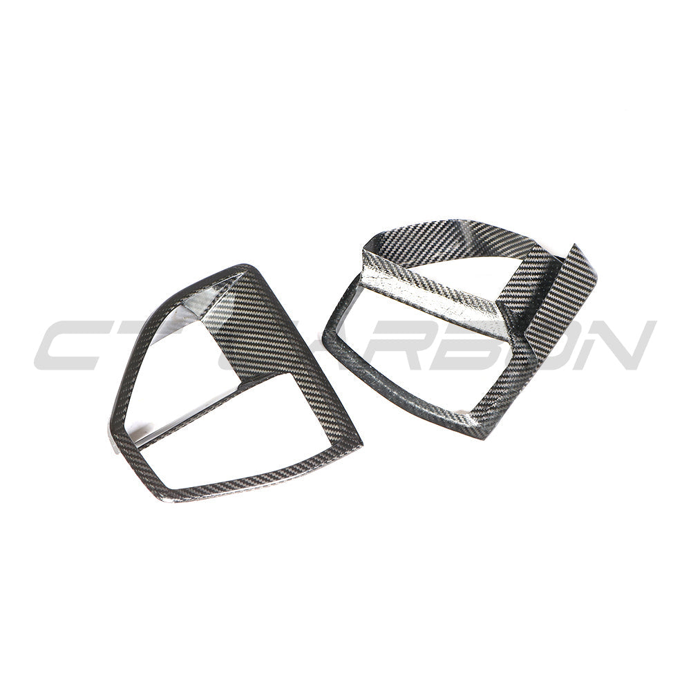 BMW G05 X5 2019-2023 CT Carbon fiber front vent add-on accessory showing sleek carbon fiber finish and detailed design.