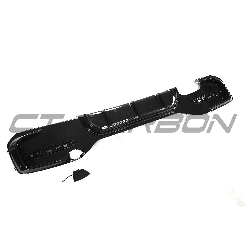 BMW F20 F21 1 Series LCI twin left gloss black kit by CT Carbon, showing sleek black carbon fiber components.