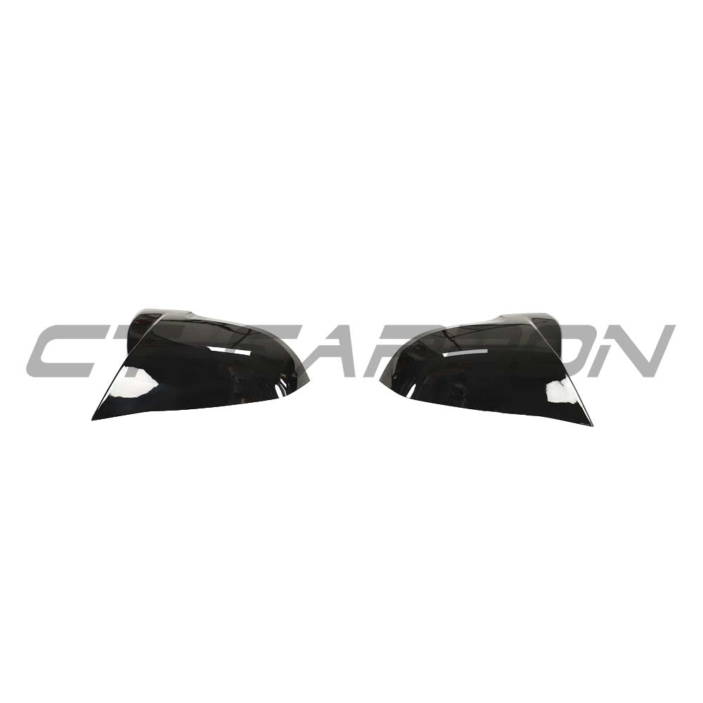 BMW F40/F44 1 & 2 Series replacement gloss black mirror covers, accessory by CT Carbon, shown on vehicle side mirrors.