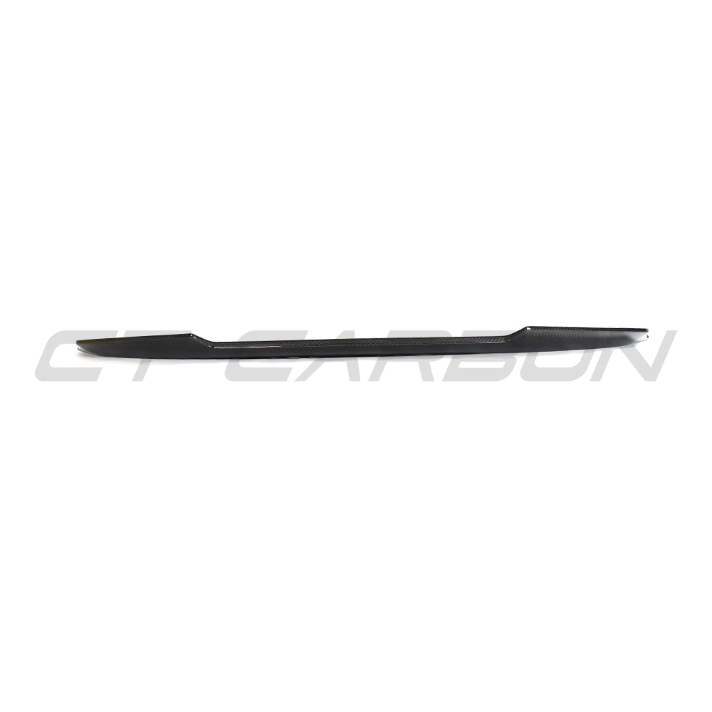 BMW G87 M2 and G42 2 Series carbon fibre spoiler by CT Carbon, V3, shown on the car's rear with sleek, aerodynamic design.