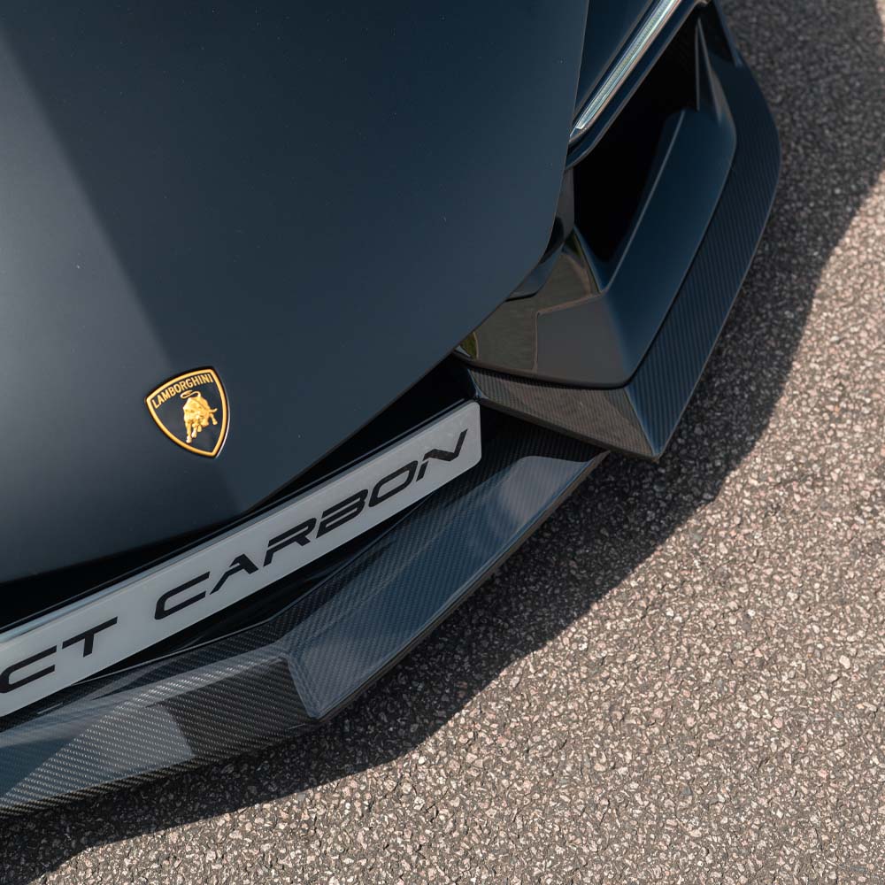 Lamborghini Reventón full carbon fiber kit by CT Carbon, showing detailed carbon fiber components on a sleek sports car.