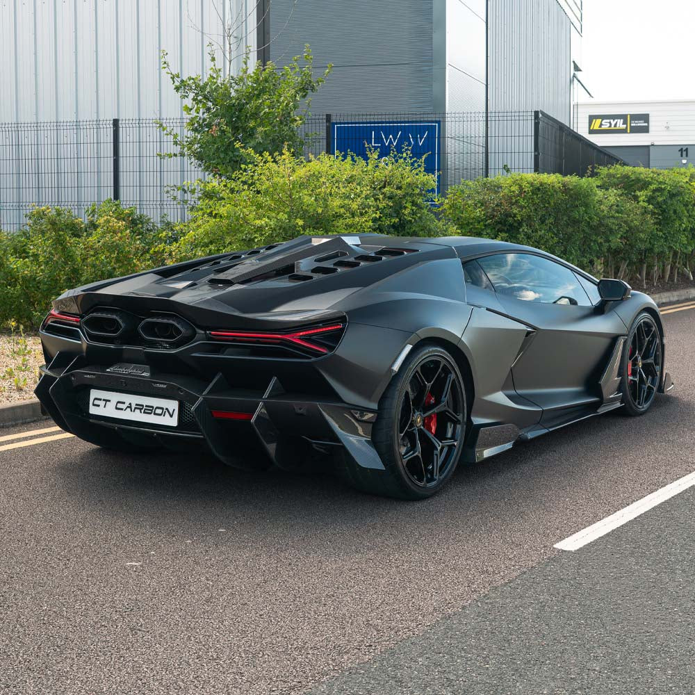 Lamborghini Revuelto full carbon fiber kit by CT Design, showing detailed carbon fiber panels and aerodynamic design features.
