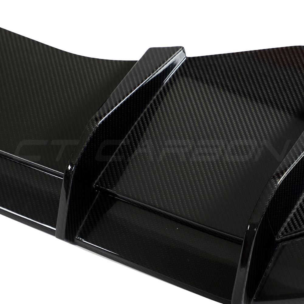 Lamborghini Huracan LP-610 carbon fibre diffuser by CT Carbon, showcasing sleek aerodynamic design and textured carbon fibre surface.