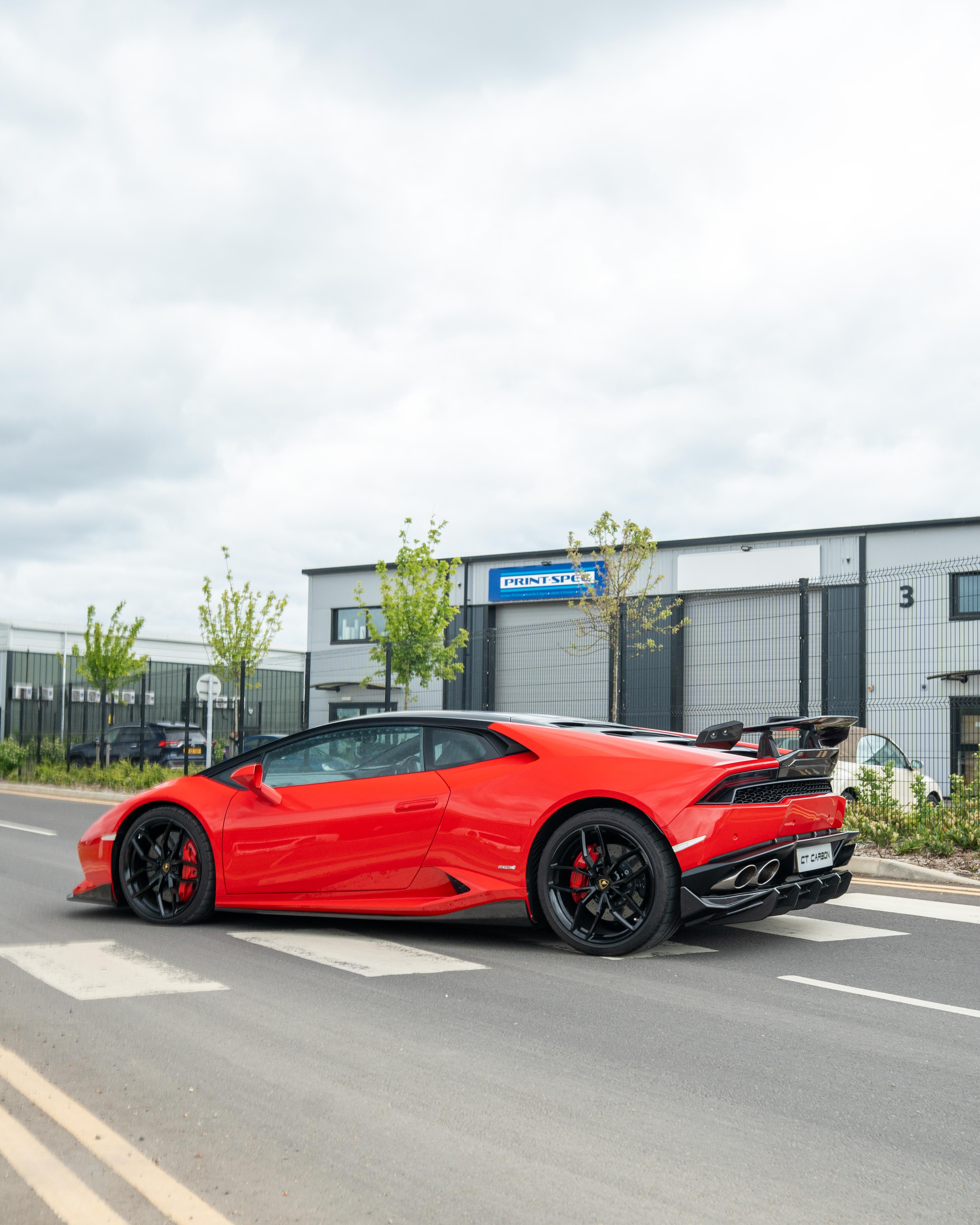 Lamborghini Huracan LP-610 carbon fibre diffuser by CT Design, showcasing sleek carbon fibre material and aerodynamic design.