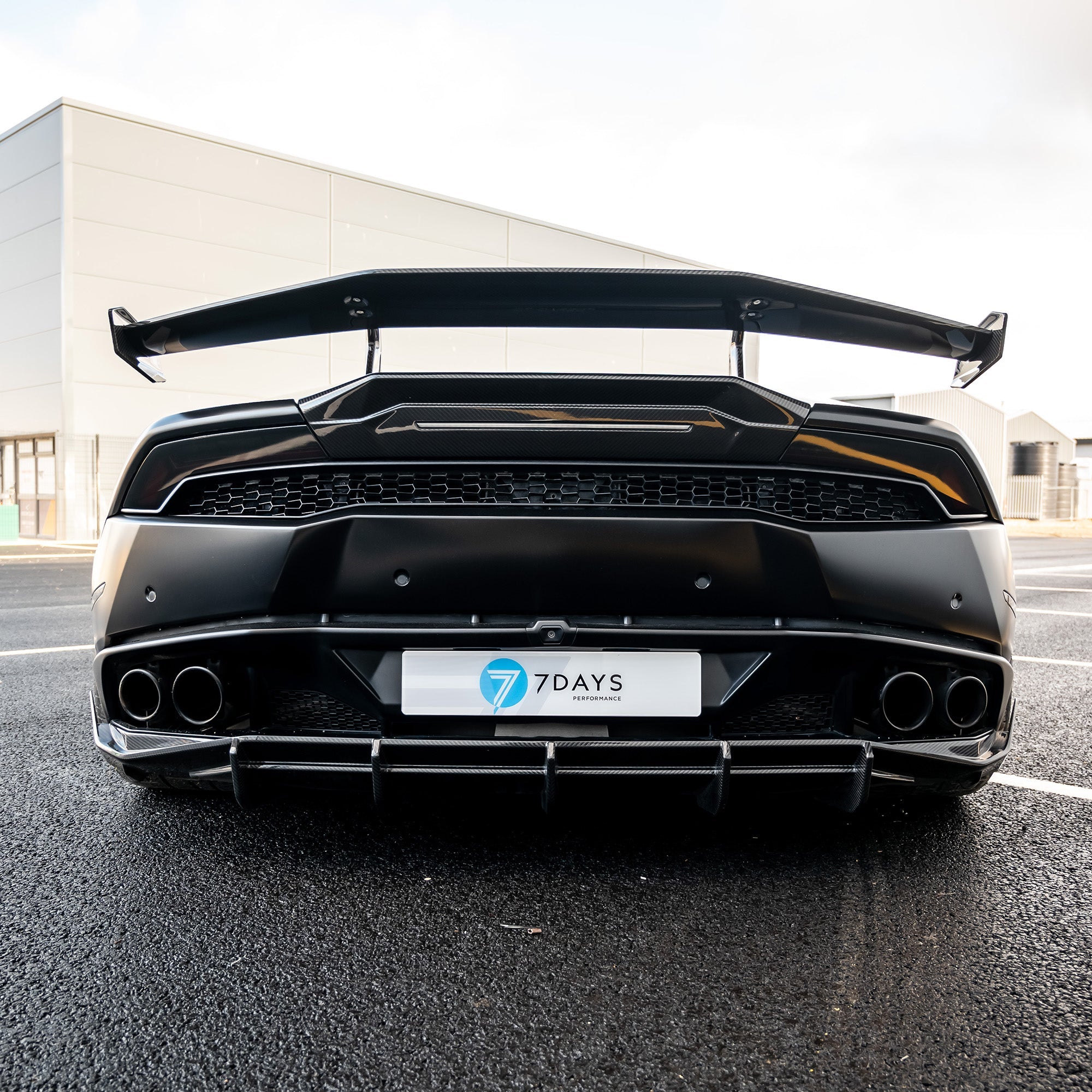 Lamborghini Huracan LP-610 carbon fibre full kit by CT Carbon, showcasing detailed carbon fibre parts and sleek automotive design.