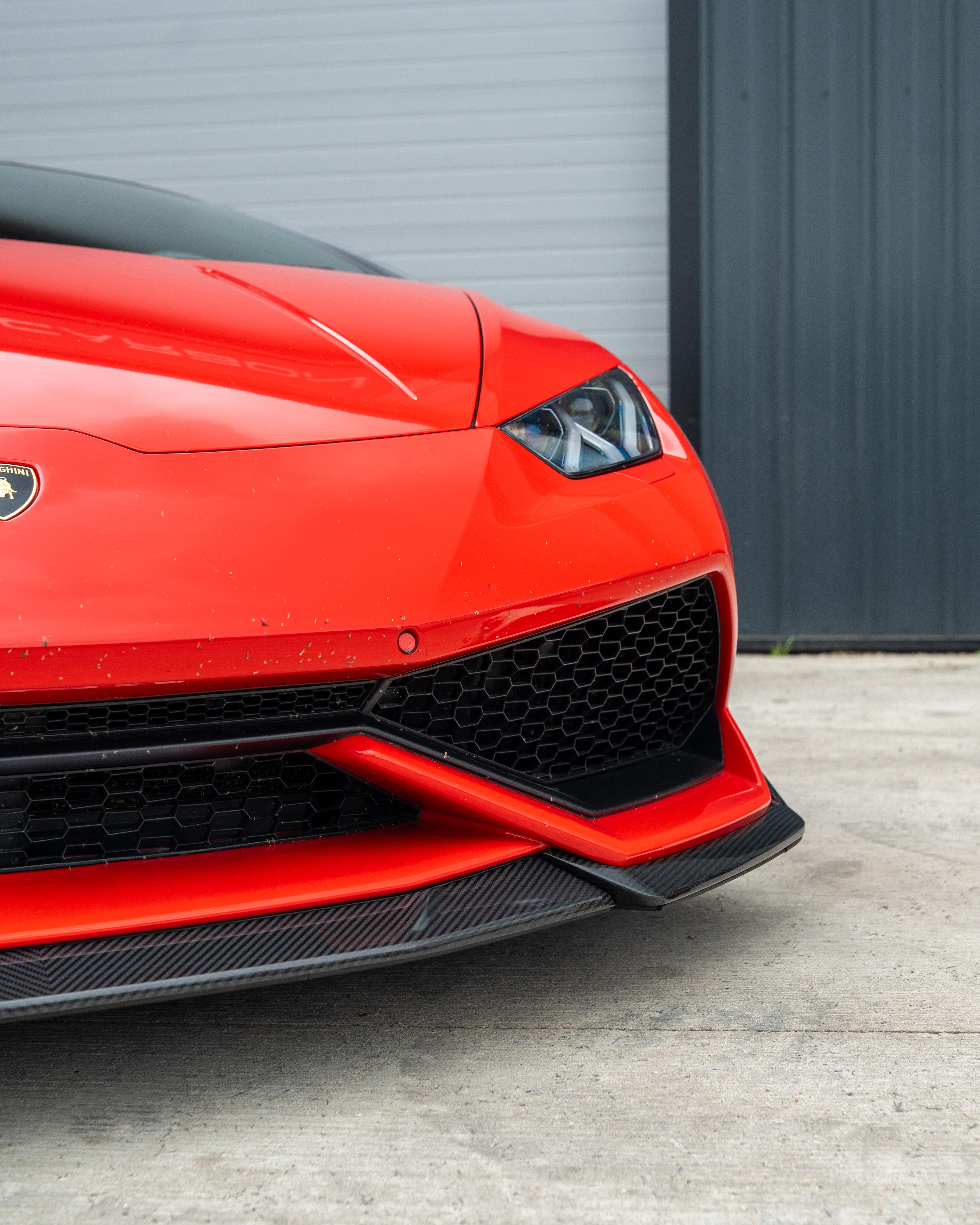 Lamborghini Huracan LP-610 carbon fibre splitter by CT Design, showcasing the aerodynamic front splitter with detailed carbon fibre texture.