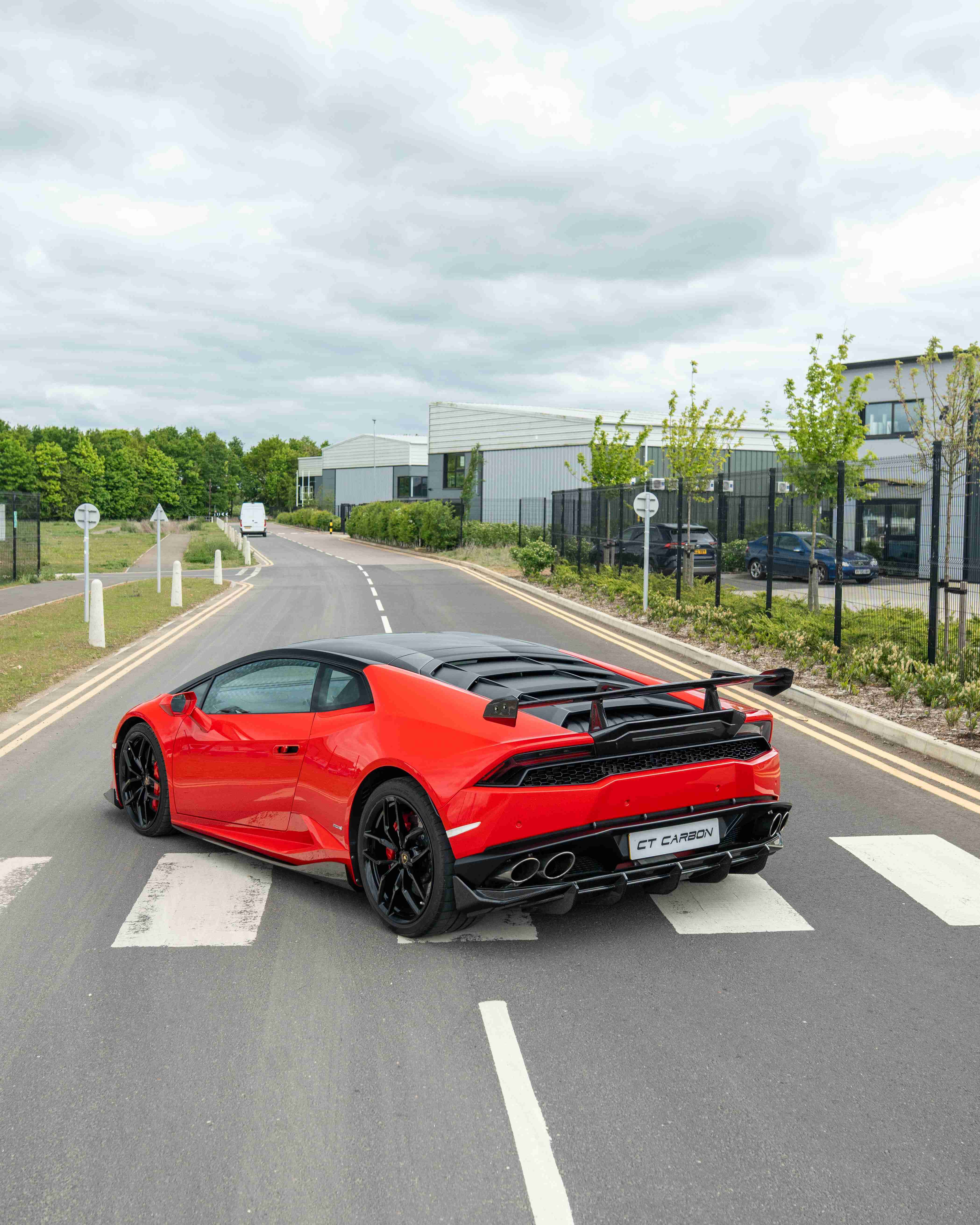 Lamborghini Huracan LP-610 carbon fibre full kit by CT Design, featuring detailed carbon fibre components on a sleek sports car.