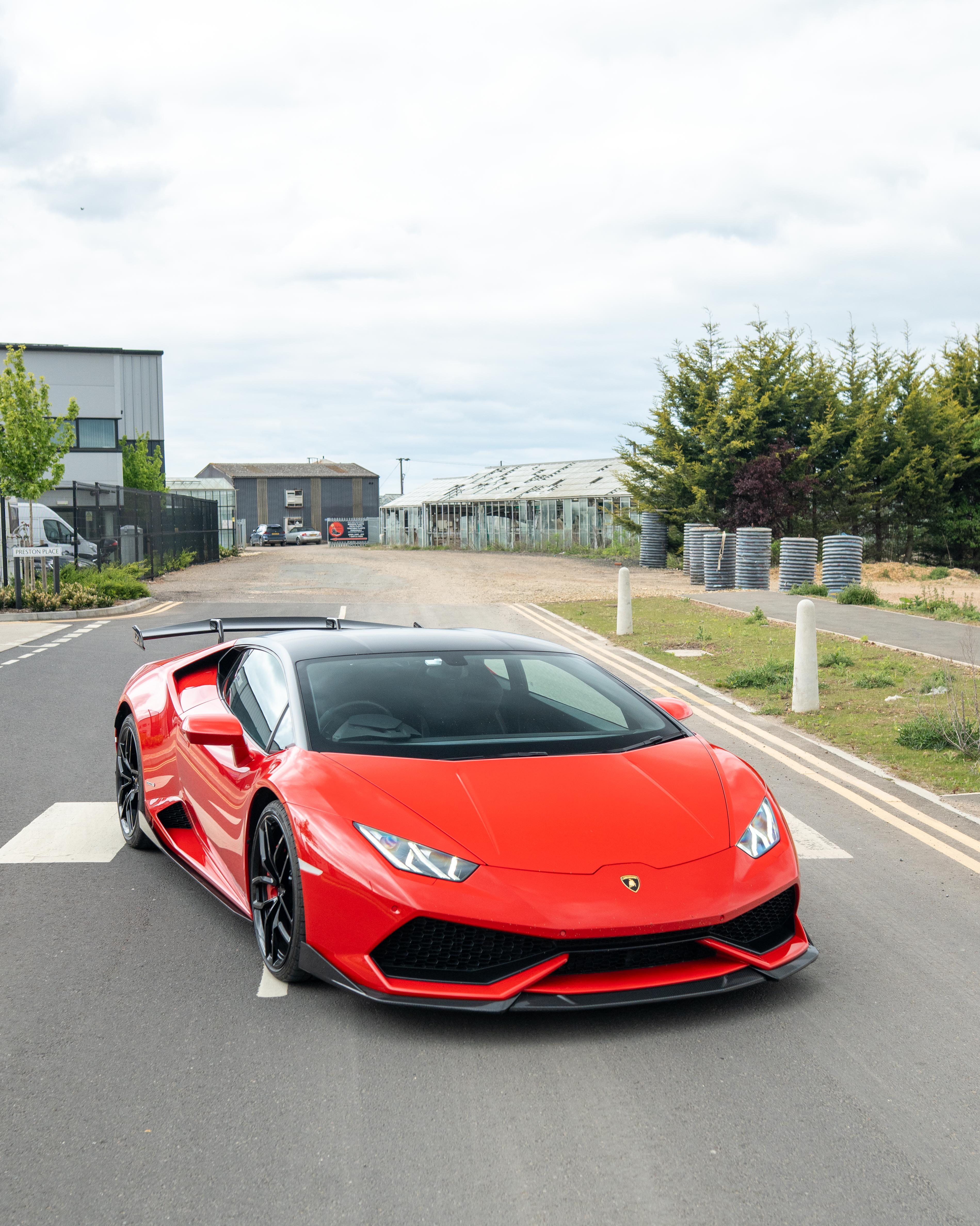 Lamborghini Huracan LP-610 carbon fibre splitter by CT Design, showcasing the sleek, aerodynamic front splitter on the supercar.