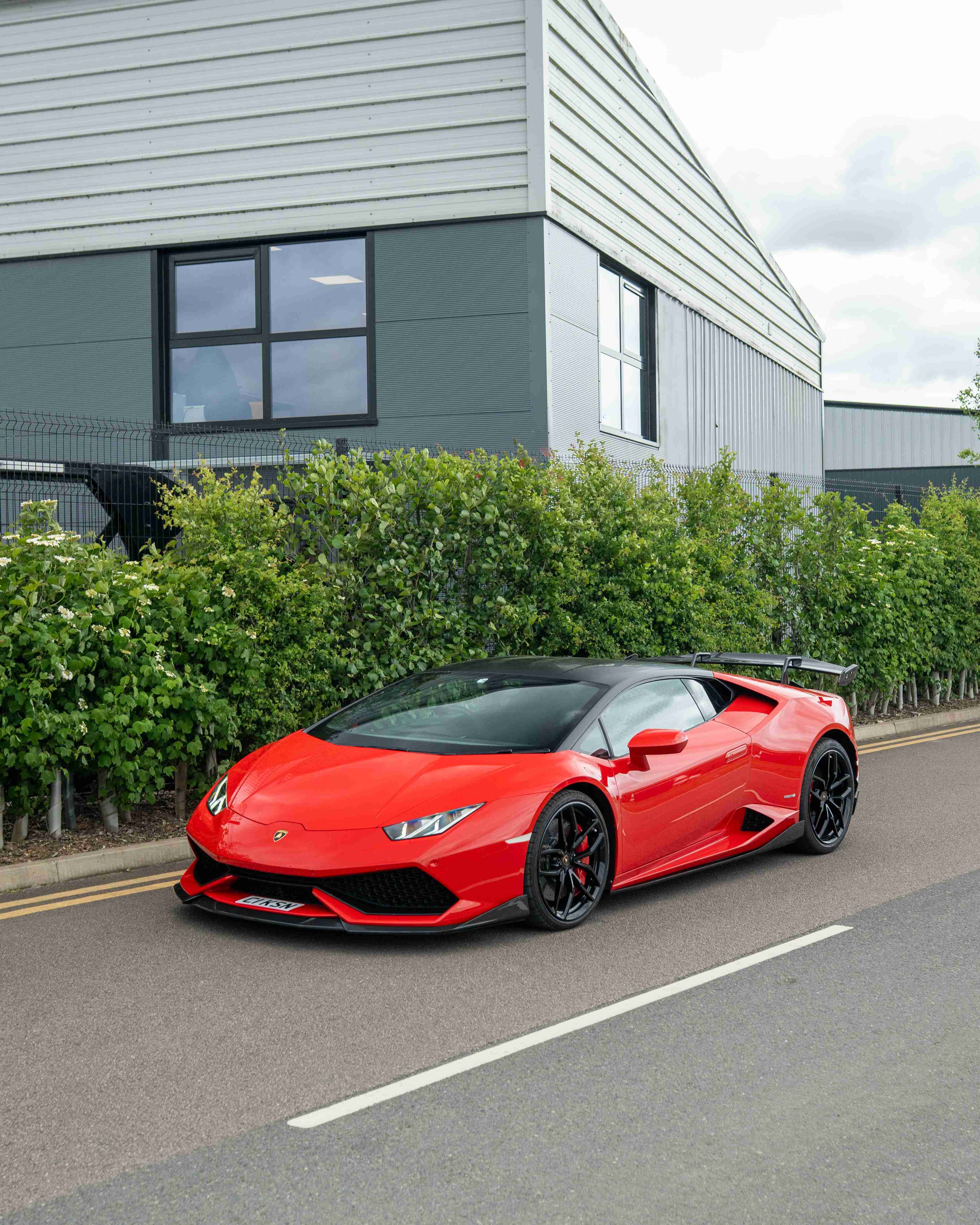 Lamborghini Huracan LP-610 carbon fibre full kit by CT Design, showing detailed carbon fibre components on the sports car.
